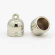 Kép 1/2 - Antikolt ezüst színű végzáró (13x10mm) közepes/50db