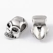 Kép 1/4 - Antikolt ezüst színű koponya alakú gyöngy (12x8x6mm)/2db