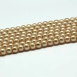 Kép 2/3 - Arany színű tekla üveggyöngy szálban (8mm)/52db