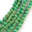 Kép 1/3 - Szintetikus howlit zöld koponya gyöngy (9x7,5mm)
