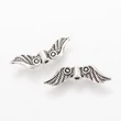 Kép 1/2 - Antikolt ezüst színű angyalszárny köztes (23x7mm)/5db