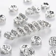 Kép 1/4 - 10db ezüst színű strasszos köztes (6x3mm)