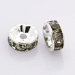 Kép 2/2 - 10db ezüst színű fekete strasszos köztes (8x4mm)
