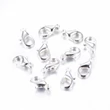 Kép 1/5 - 10db Ezüst színű delfinkapocs (12x6mm)