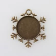 Kép 1/2 - Antikolt bronz színű hópihe alakú medál (25mm)