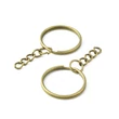 Kép 2/3 - 4db Bronz színű kulcstartókarika lánccal (25mm) Kép 2/3 - 4db Bronz színű kulcstartókarika lánccal (25mm)