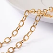 Kép 1/7 - Arany színű nemesacél vastag keresztezett szemű ékszerlánc (7x4mm)