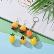 Kép 3/6 - 30db vegyes színű műgyanta gyümölcsök dobozban (24~35x22~21mm)