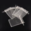 Kép 1/6 - Törtfehér színű organza tasak (15x10cm)
