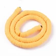 Kép 3/3 - Aranysárga polimer lapított gyöngy (8mm/190db)