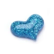 Kép 2/2 - Kék glitteres szív műgyanta kaboson  (22x17x6mm)