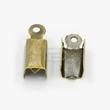 Kép 1/4 - 10db antikolt bronz színű bőrvégzáró (6x3mm)