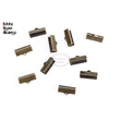 Kép 1/3 - 10db antikolt bronz színű szalagvégzáró (16mm)
