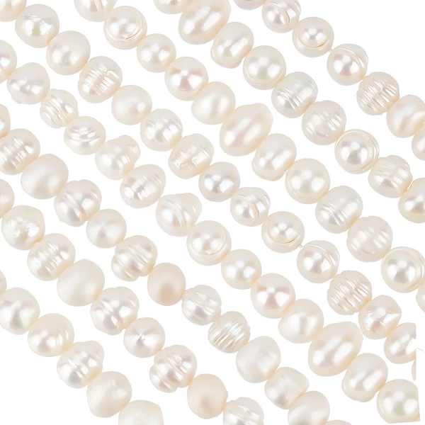 Természetes édesvízi gyöngy szálban (6~7x7~8.5mm) /26db