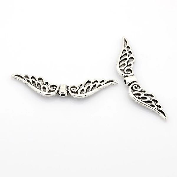 Antikolt ezüst színű angyalszárny köztes (11X52mm) Antikolt ezüst színű angyalszárny köztes (11X52mm)