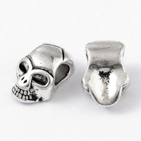 Antikolt ezüst színű koponya alakú gyöngy (12x8x6mm)/2db Antikolt ezüst színű koponya alakú gyöngy (12x8x6mm)/2db