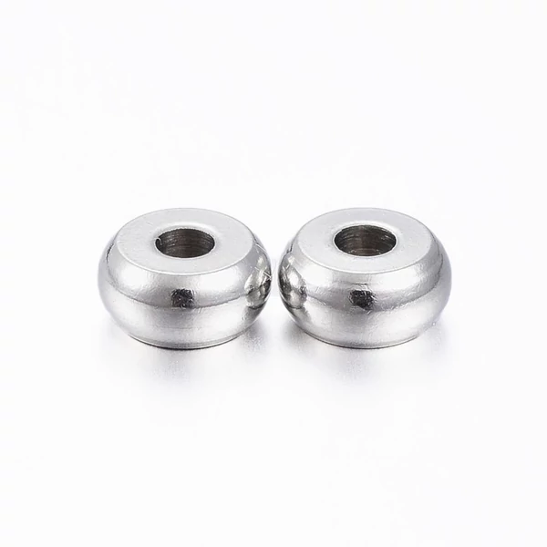 5db nemesacél fánk alakú köztes (6x3mm) 5db nemesacél fánk alakú köztes (6x3mm)