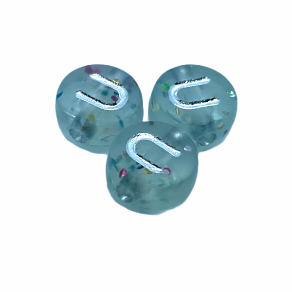 Műanyag glitterrel díszített kör "U" betűgyöngy (7mm)