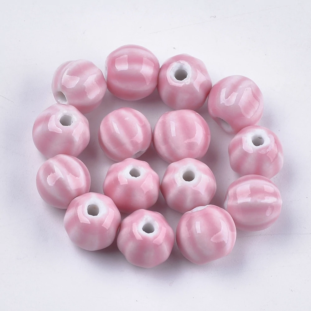 Rózsaszín csíkos porcelán, kerámia gyöngy (12x10mm)