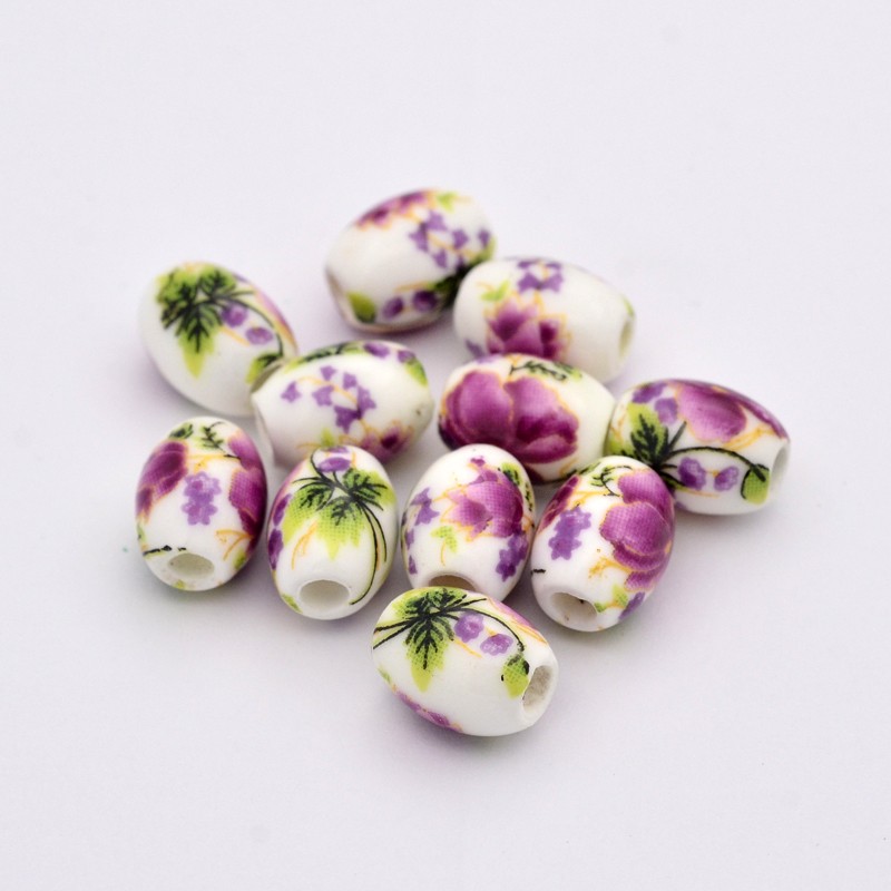 Lila virágos, hordó alakú porcelán, kerámia gyöngy (10x8mm)