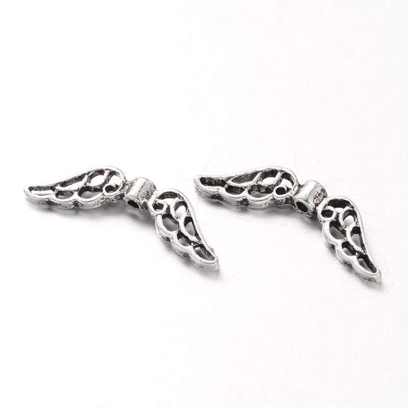Antikolt ezüst színű angyalszárny köztes (21x6mm)/5db