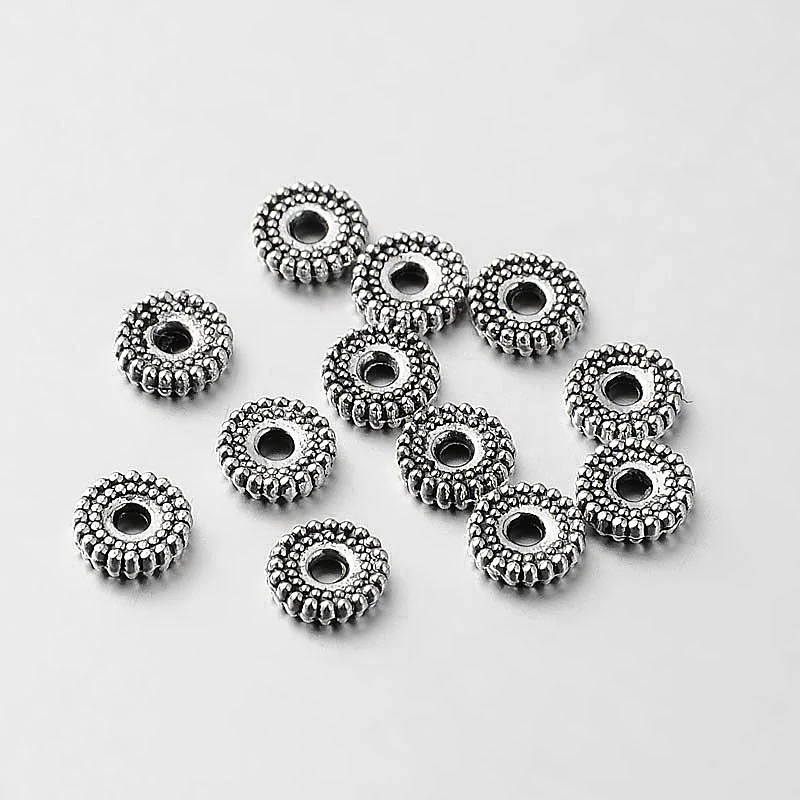 10db Antikolt ezüst fogazott köztes (7x2mm)