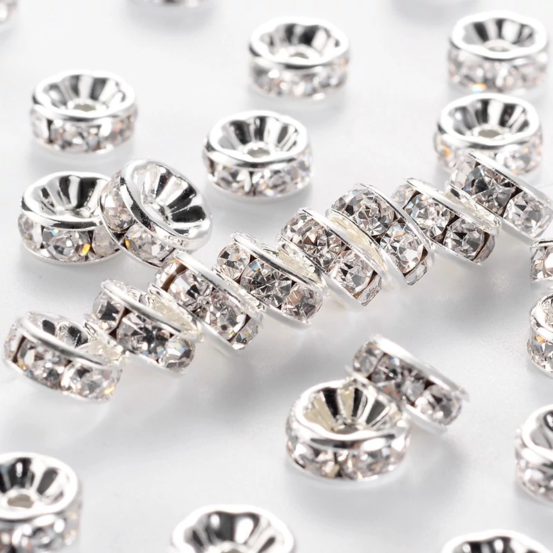 10db ezüst színű átlátszó strasszos köztes (8x4mm)