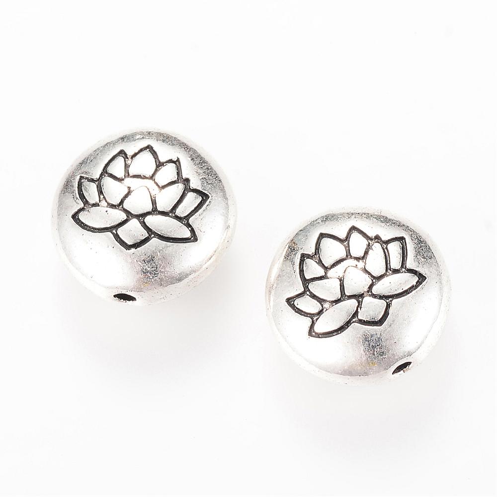 Antikolt ezüst színű lótusz mintás lapított gyöngy (14x6,5mm)