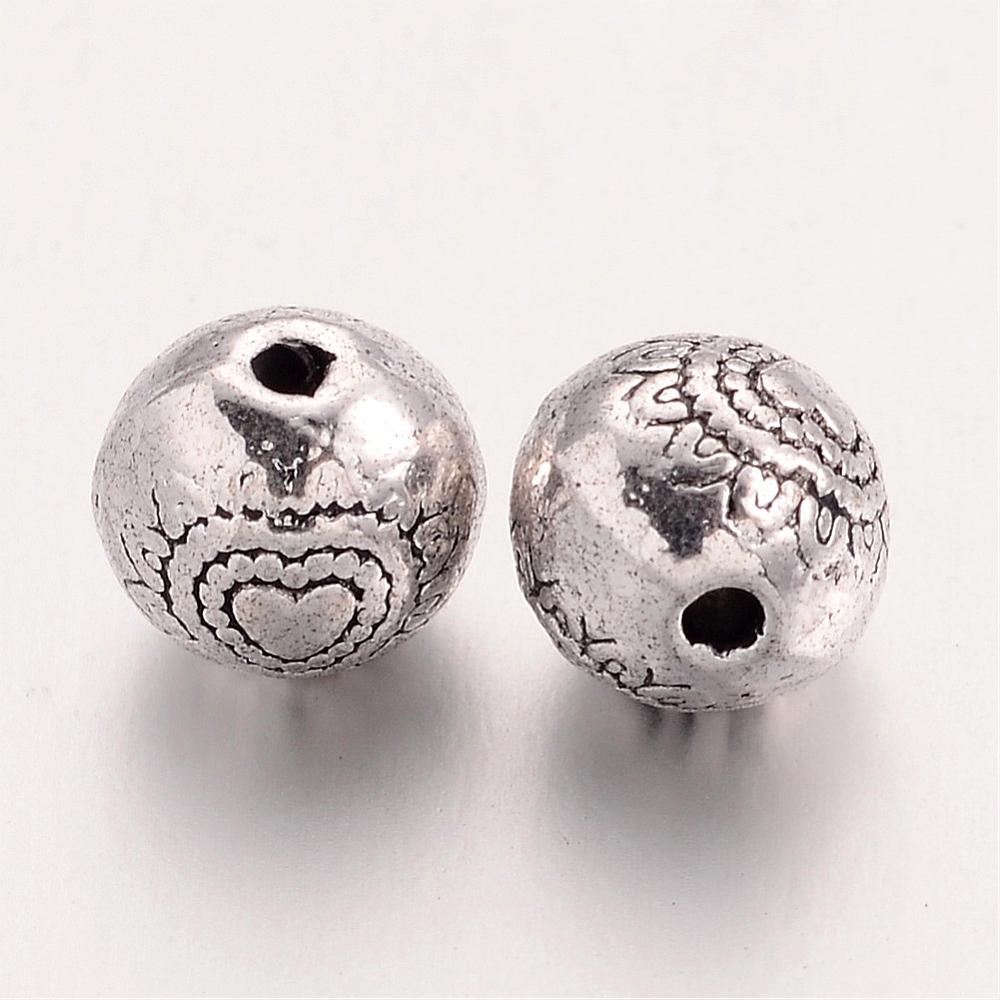 Antikolt ezüst színű szív mintás golyó alakú gyöngy (6mm)/4db