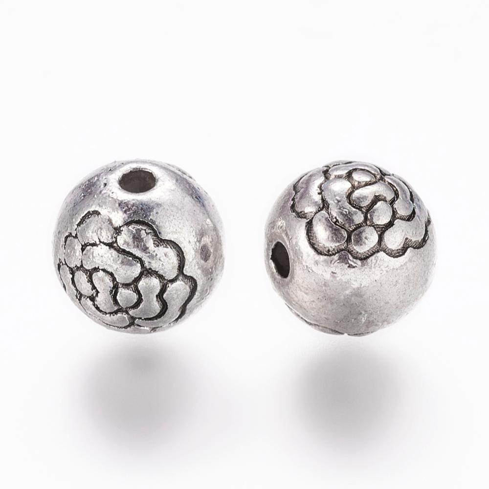 Antikolt ezüst színű virágos golyó alakú gyöngy (8mm)