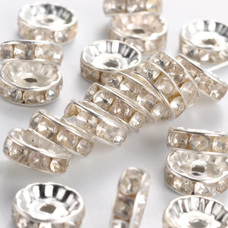 10db ezüst színű strasszos köztes (10x4mm)