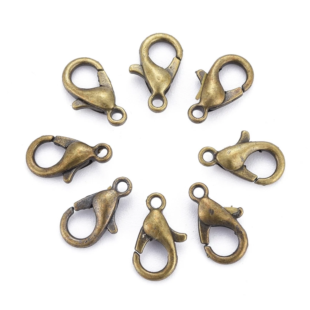 10db Antikolt bronz színű delfinkapocs (12x7mm)