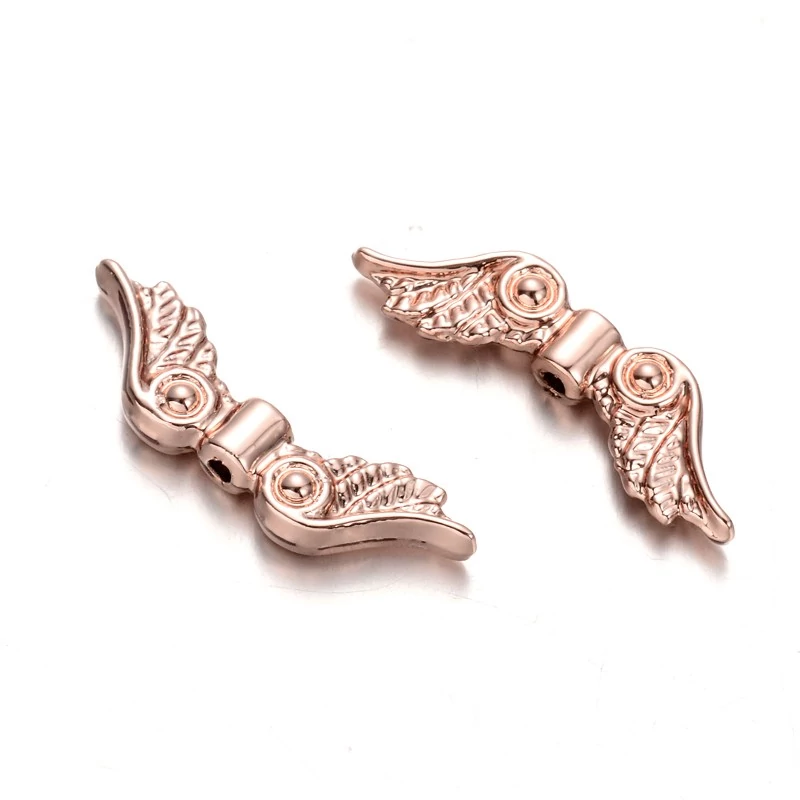 Rozé arany színű angyalszárny köztes (23x7x3mm)