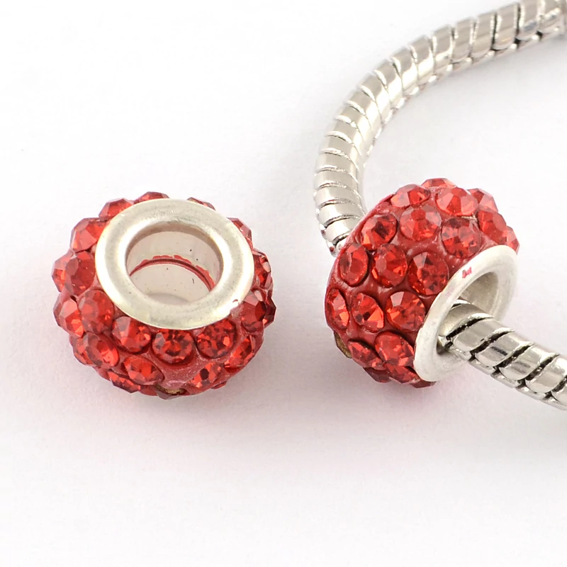 Strasszos piros nagy lyukú gyöngy (11x7mm)